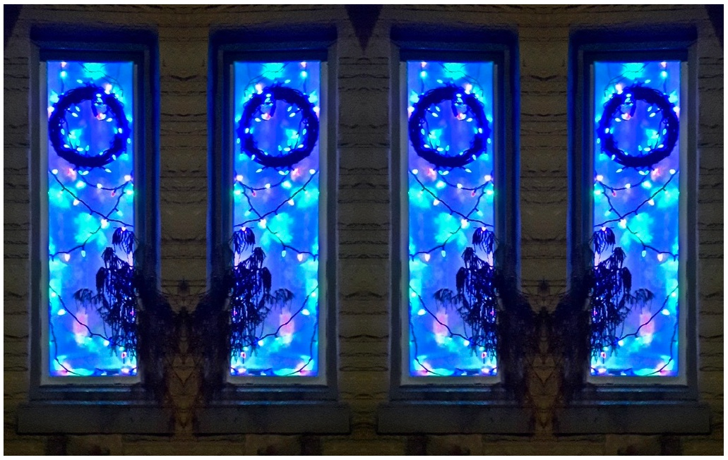 wreaths and boughs in blue and purply windows