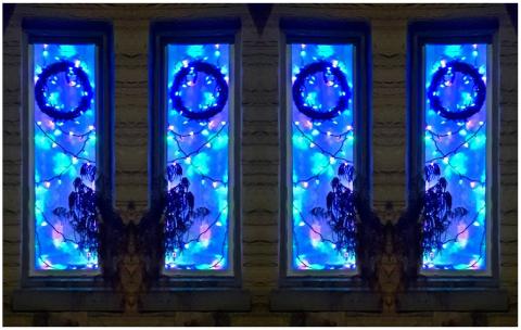 wreaths and boughs in blue and purply windows