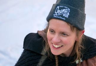 rC in an IRENE'S toque, smiling in the snow